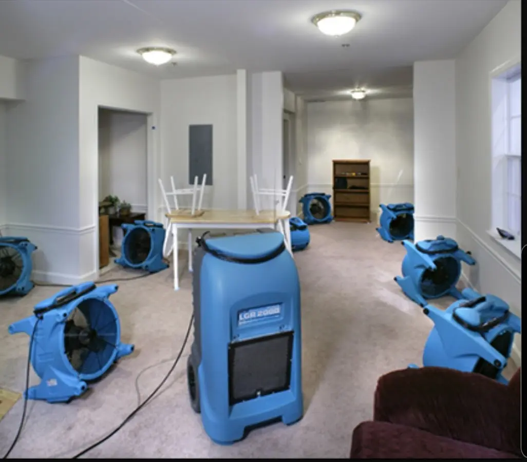 Air movers and dehumidifier setup for Water Extraction & Removal in Buckeye